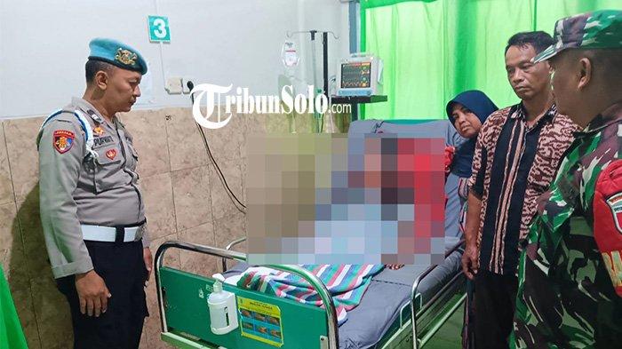 DIANIAYA TETANGGA. Wanita yang menjadi korban penganiayaan oleh tetangganya sendiri saat mendapatkan perawatan di rumah sakit, Jumat (21/2/2025). Tribun Solo/Istimewa/Polres Wonogiri