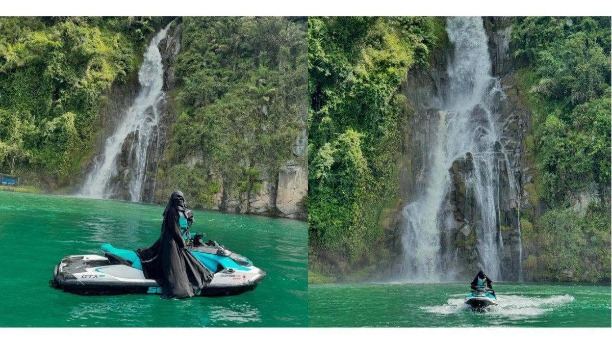 5 foto Ummi Pipik jelajahi Pulau Samosir - Danau Toba naik jetsky, Pose cantik didepan air terjun