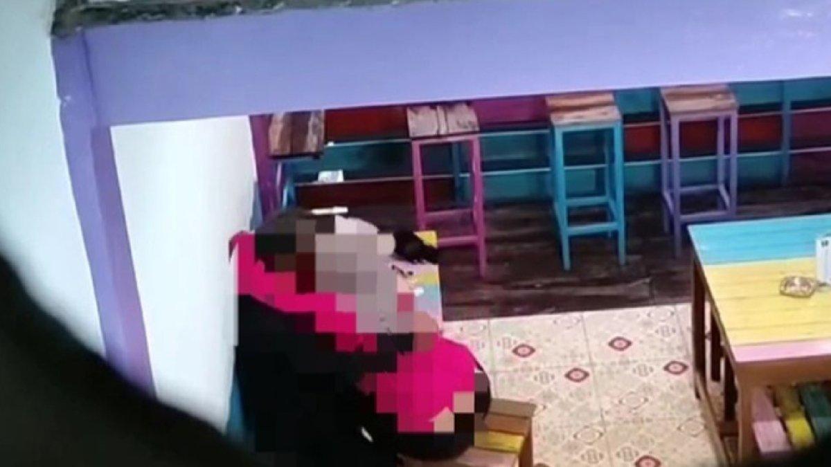 Rekaman video CCTV yang memperlihatkan aksi mesum yang dilakukan seorang pria dan wanita di dalam kedai kopi kawasan Cilandak Timur, Pasar Minggu, Jakarta Selatan.