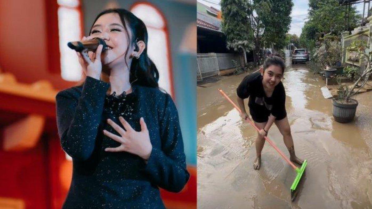 BERSIHKAN SISA BANJIR - Beda jauh saat manggung, gaya Ziva kala bersihkan sisa banjir terekam. 