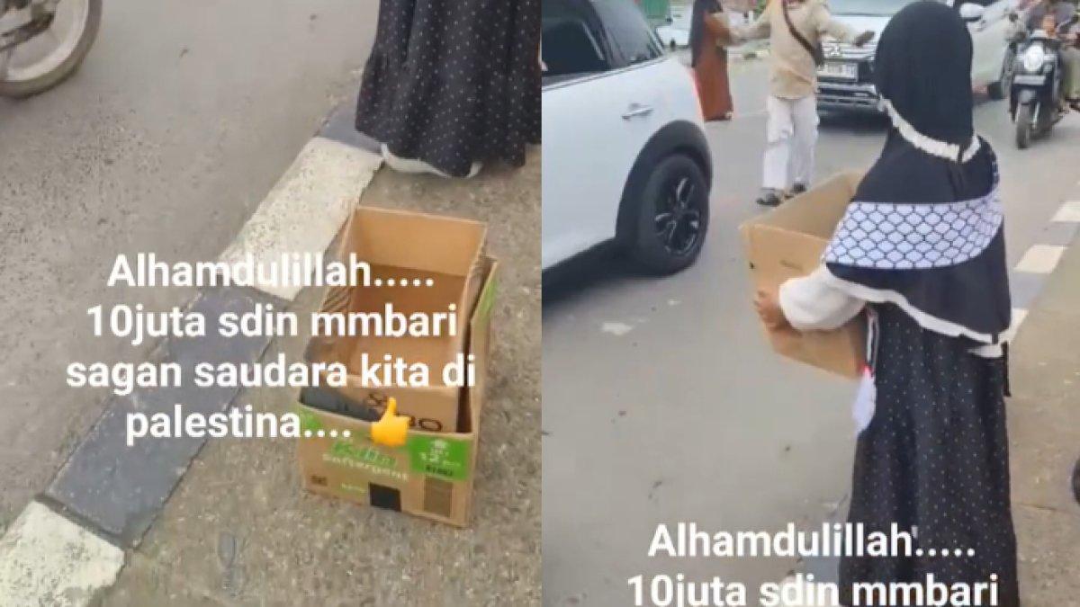 Bocah perempuan berdiri di trotoar jalan ikut bantu galang dana untuk Palestina