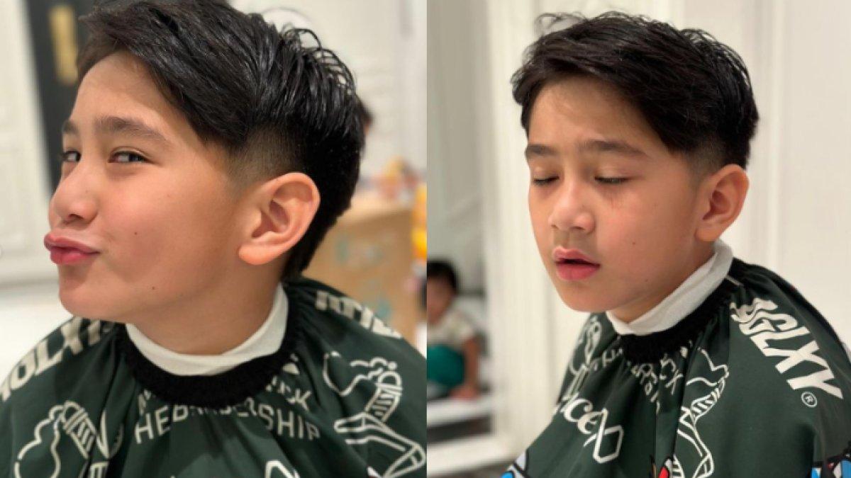 Di tengah proses cukur rambut, Rafathar sesekali bertingkah lucu.