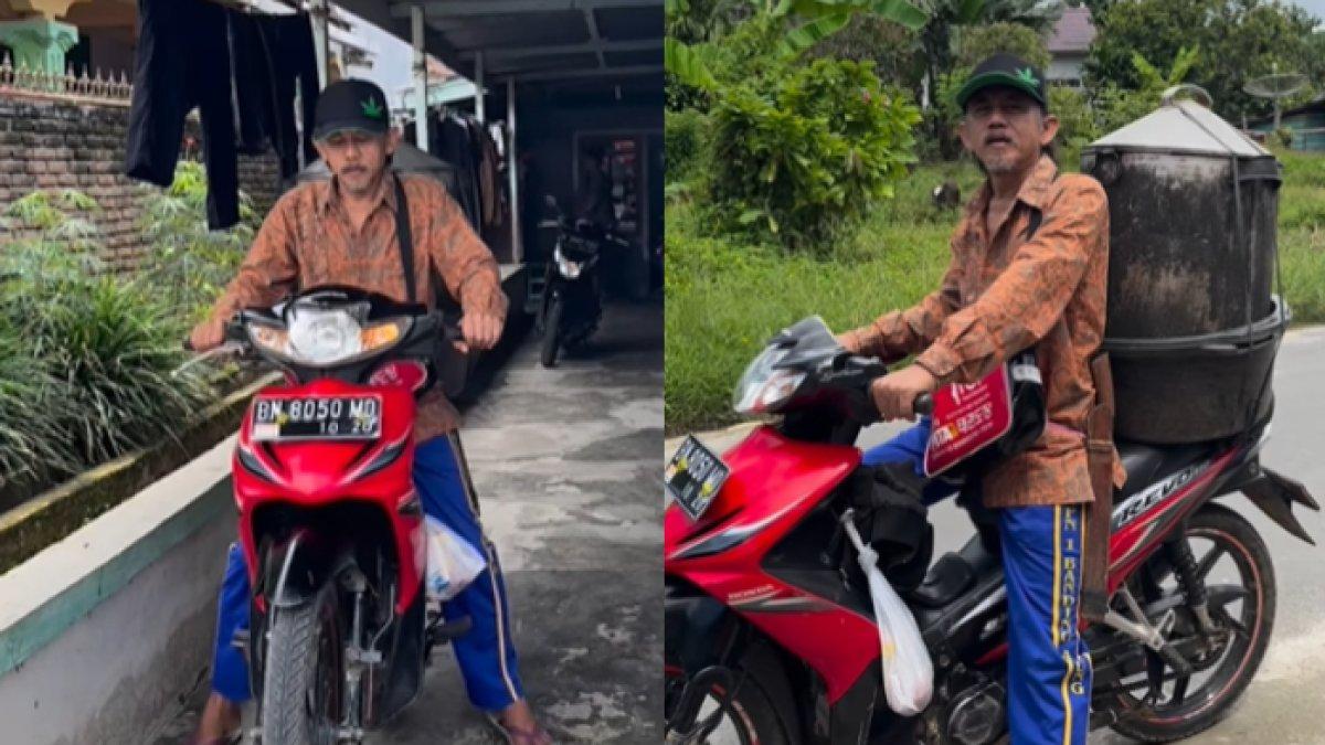 Epy berpenampilan sederhana dengan mengenakan kemeja batik, celana training, sandal jepit, dan topi.