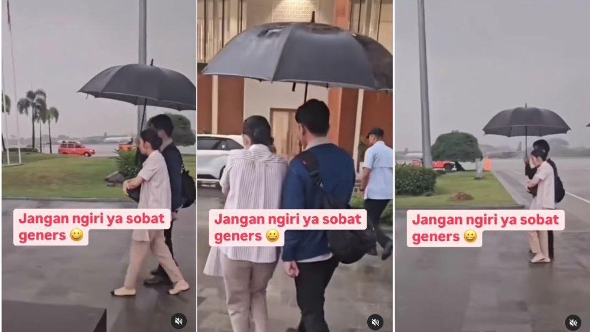 GIBRAN PAYUNGI SELVI - Biasa cuek dan tak romantis, Gibran Rakabuming kepergok payungi Selvi Ananda saat hujan-hujanan.