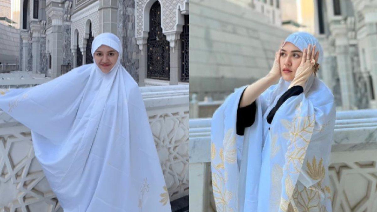 Happy tampil memesona dengan balutan gamis dan hijab