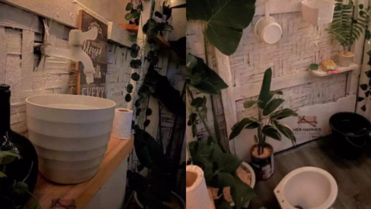 Interior dalam kamar mandi yang luarnya tampak reyot dan kumuh