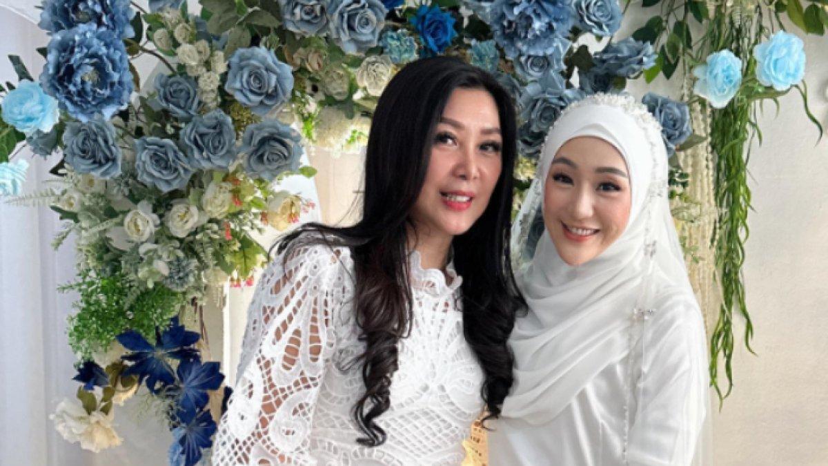Julie tampil menawan di pernikahan Larissa Chou