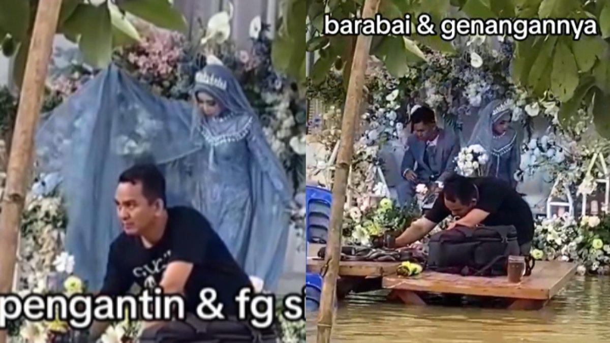 Kedua mempelai sibuk mengabadikan momen pernikahan mereka di atas banjir