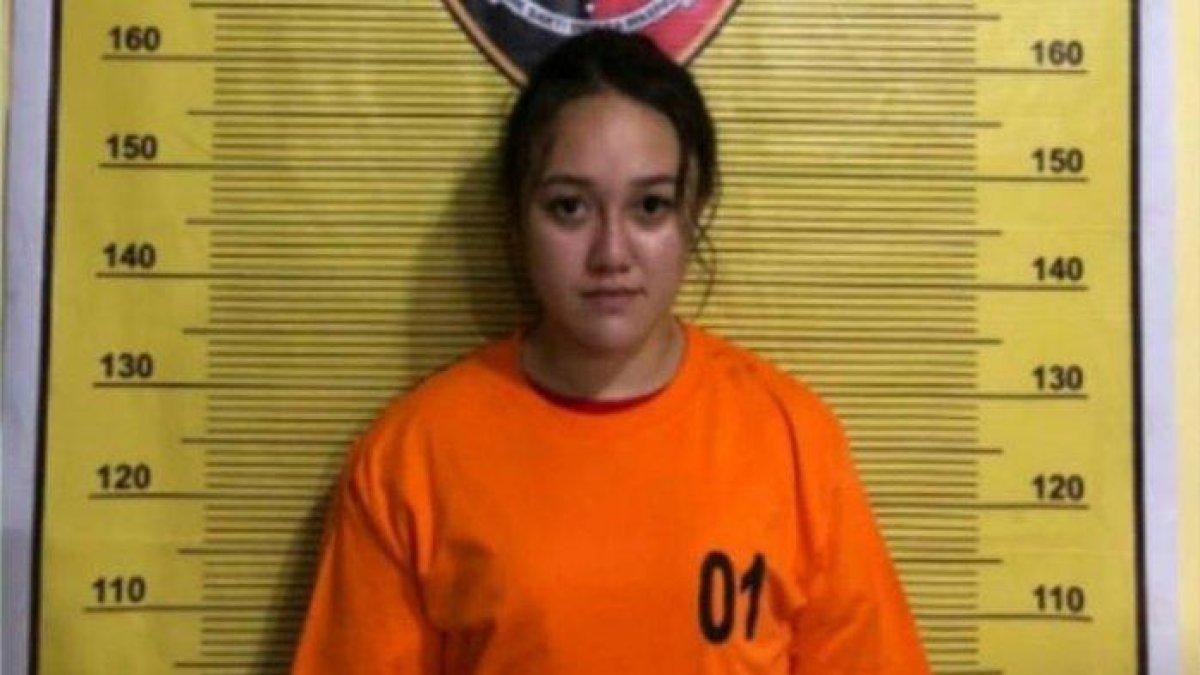 Kepala Desa Lau Mulgap, Asri Nurmala Sitepu saat ditetapkan tersangka oleh Polres Binjai