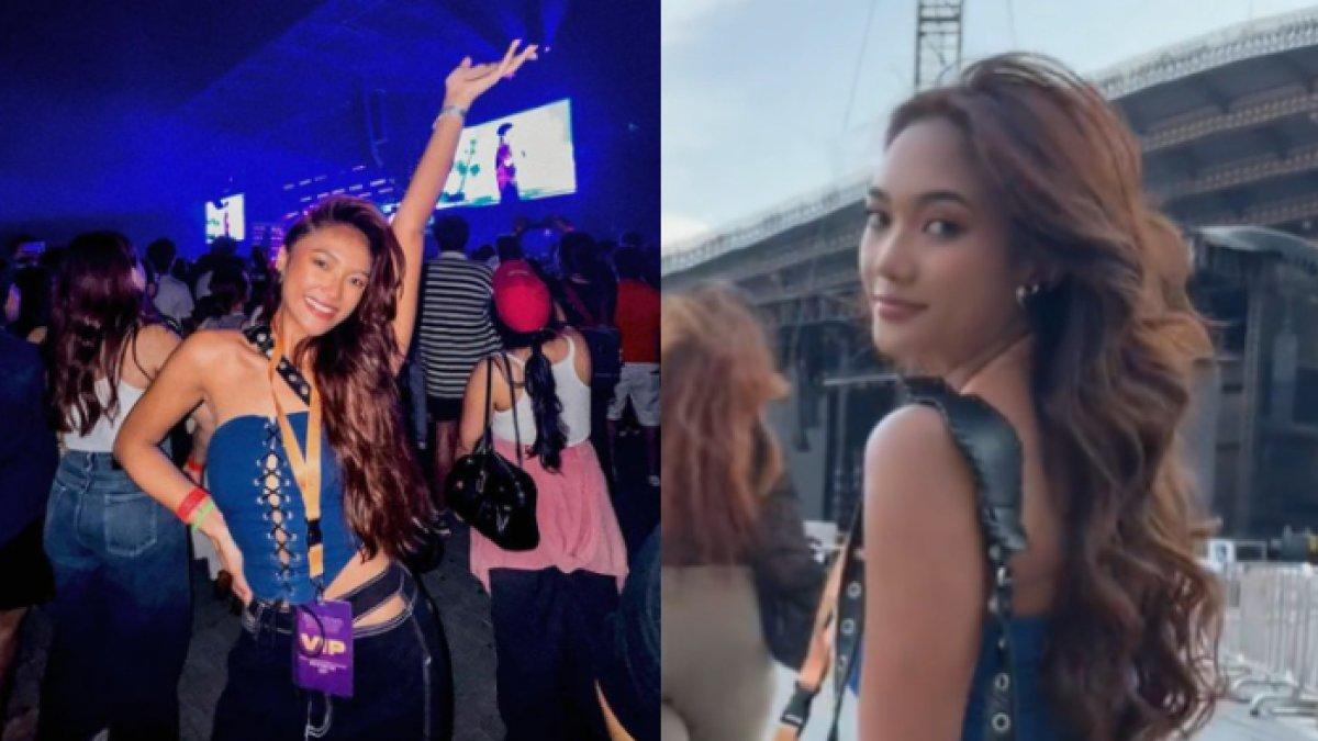 Marion Jola memakai kemben warna biru yang dipadukan dengan celana denim