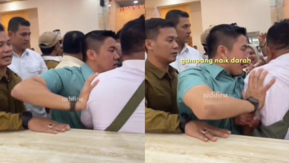 Mayor Teddy mendorong pria berbaju putih yang berusaha mendekati Prabowo di tengah suasana yang sudah padat