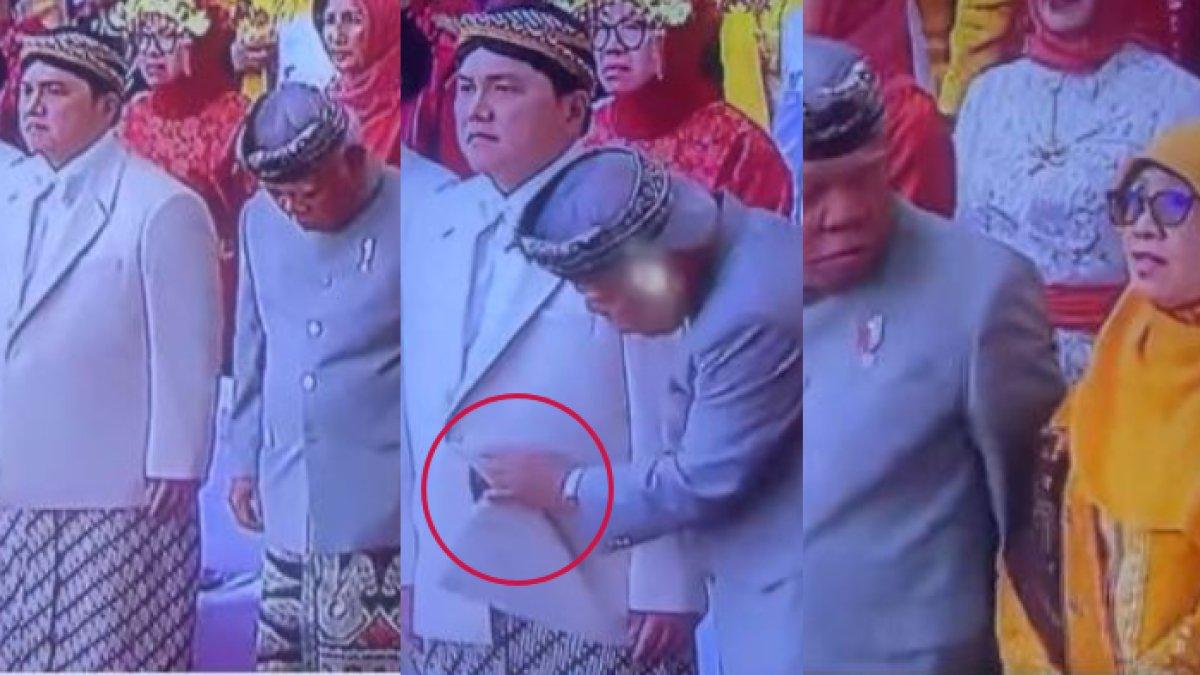 Menteri PUPR Basuki Hadimuljono kepo baju Erick Thohir saat upacara HUT ke-78 RI