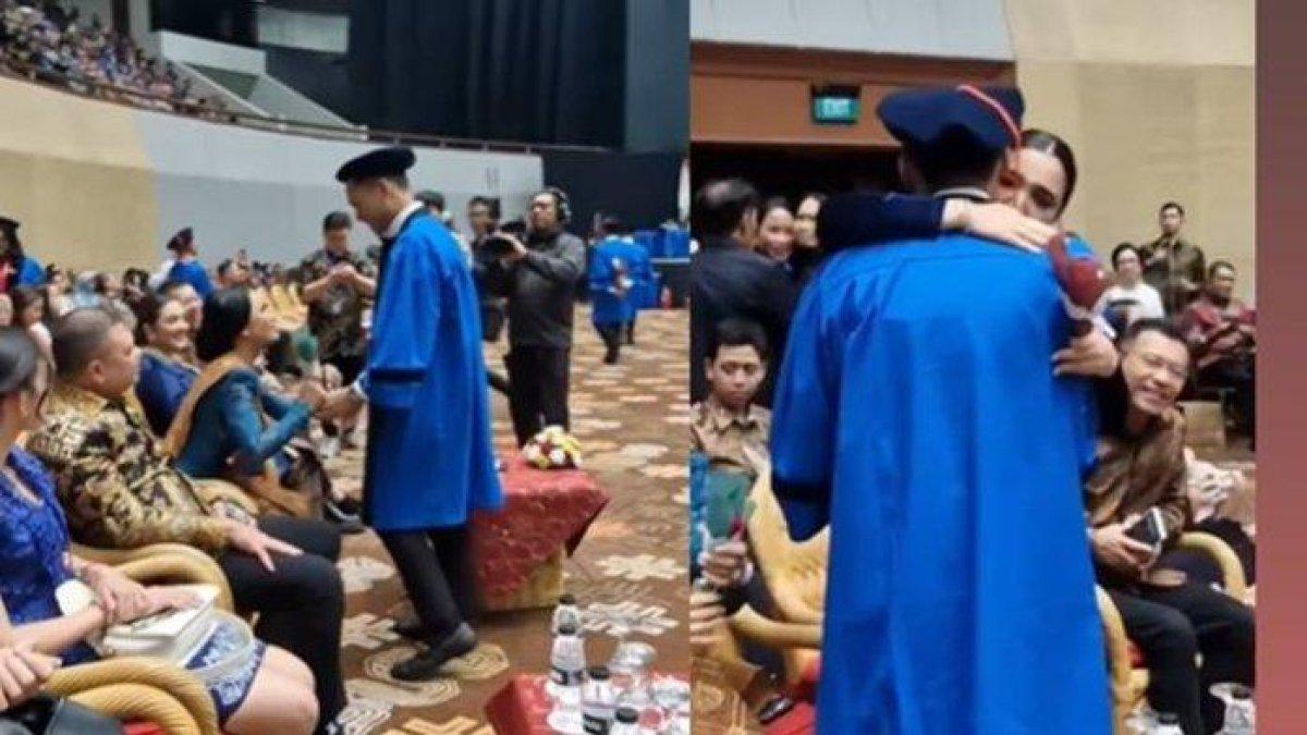 Momen Azriel memberikan bunga untuk Krisdayanti