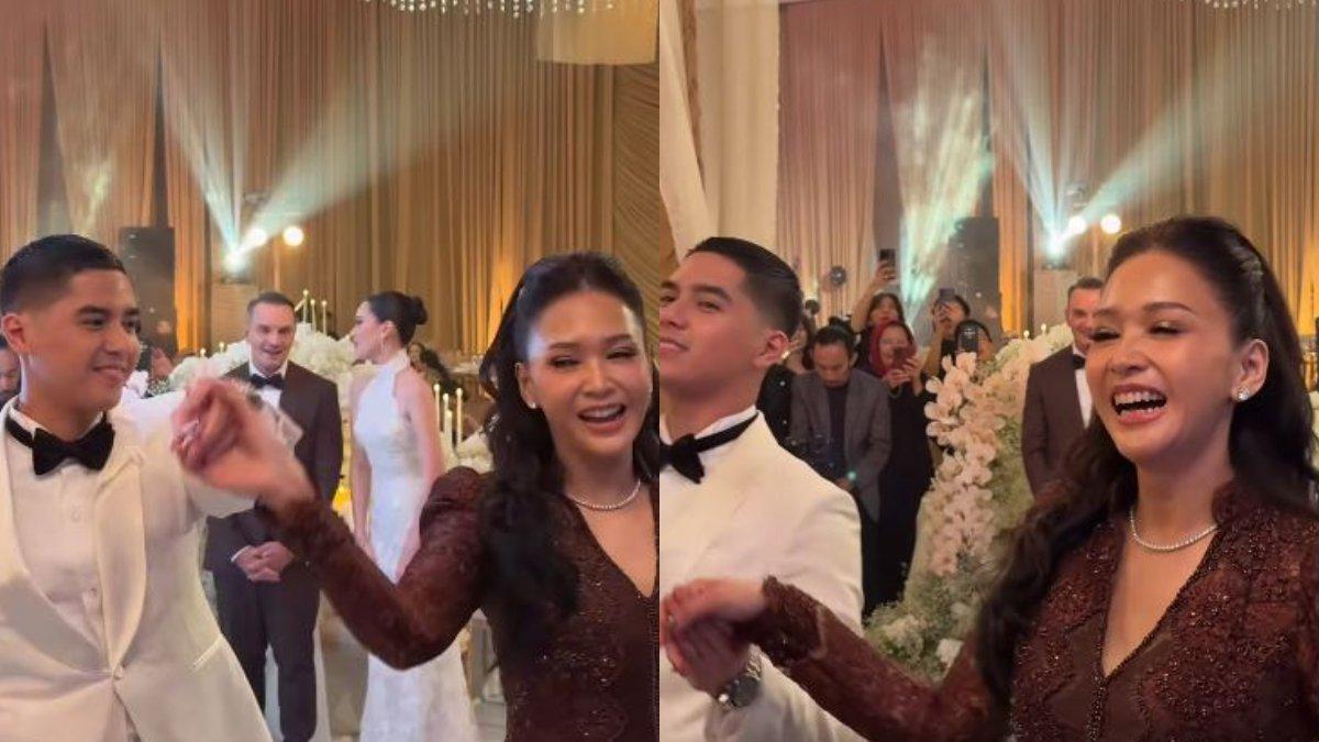 AL GHAZALI DANSA - Momen itu begitu menyentuh Al Ghazali menggenggam tangan Maia Estianty dengan lembut, senyum keduanya merekah, mata mereka saling menatap penuh kasih.