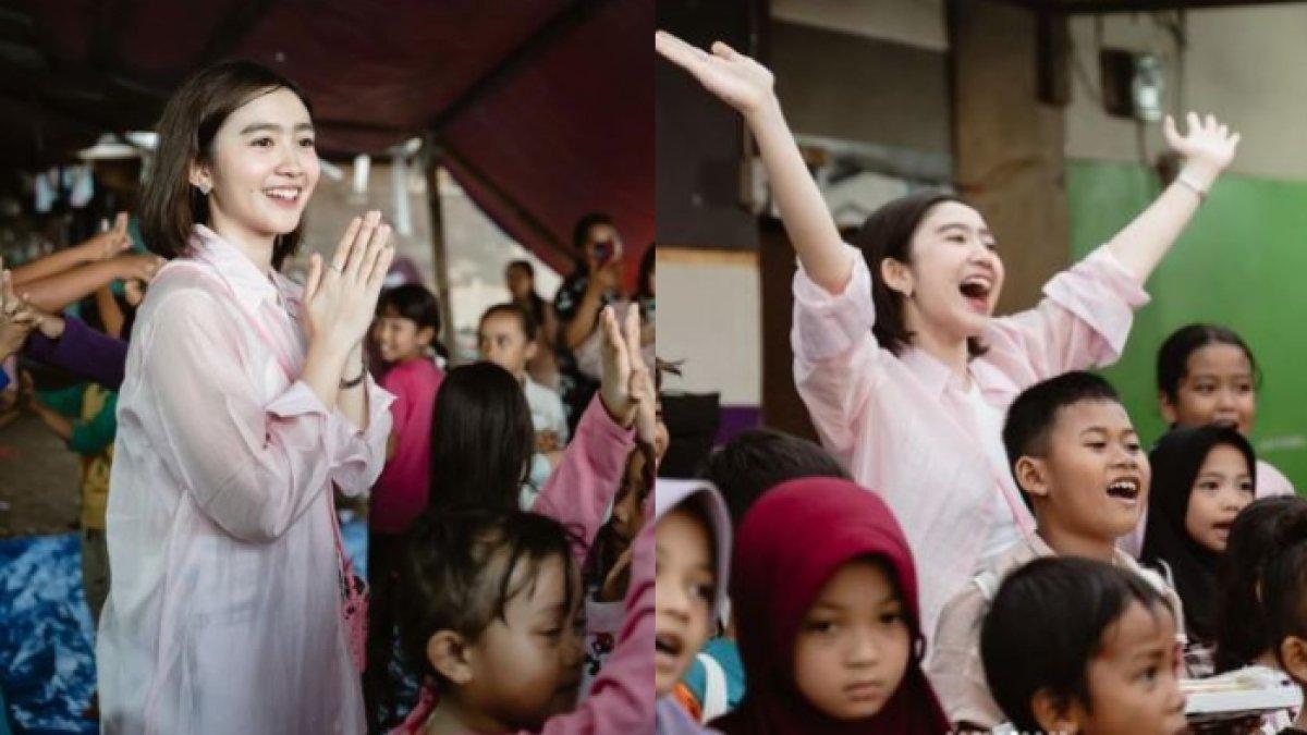 Momen keakraban Febby Rastanty dan anak-anak pemulung di sana