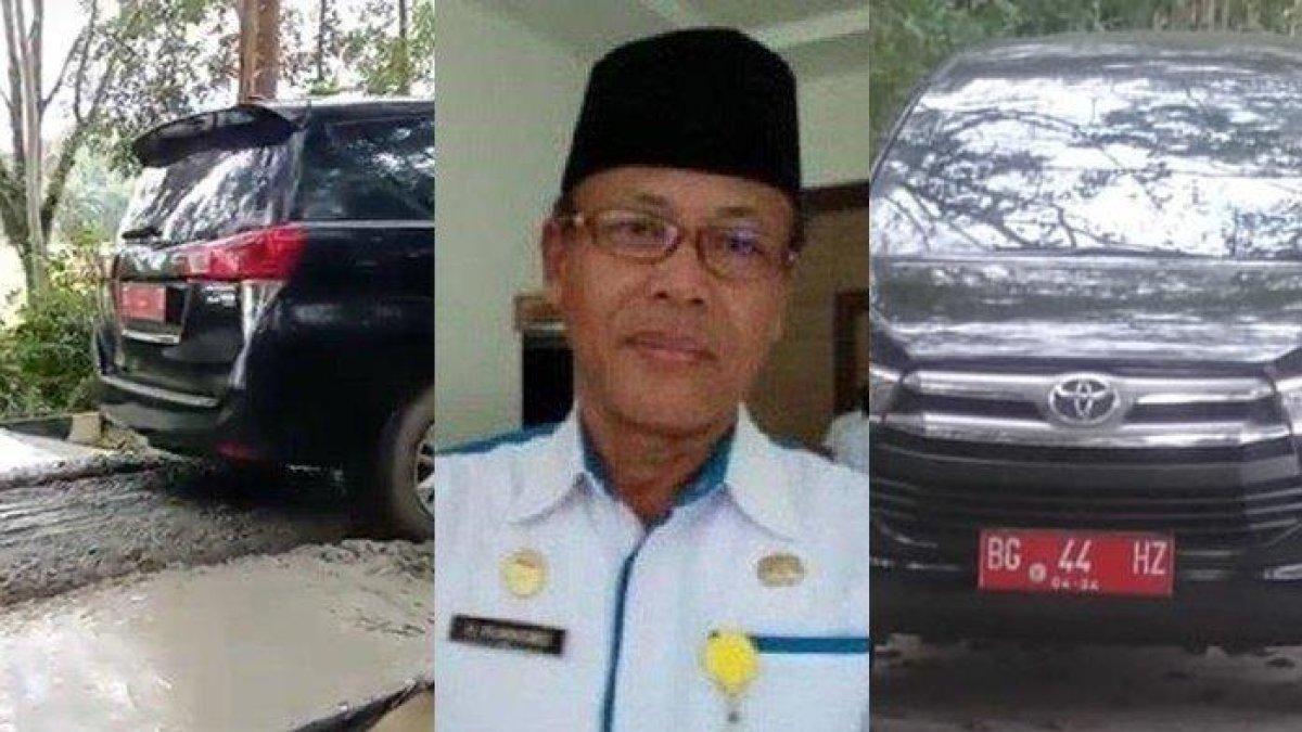 Nasib Purnomo Kadispora Lubuklinggau (tengah) usai mobil dinas terobos jalan cor basah