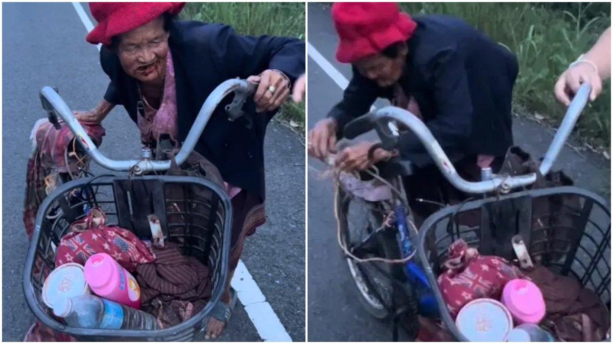 Nenek-nenek naik sepeda butut dibantu pulang ke rumahnya.