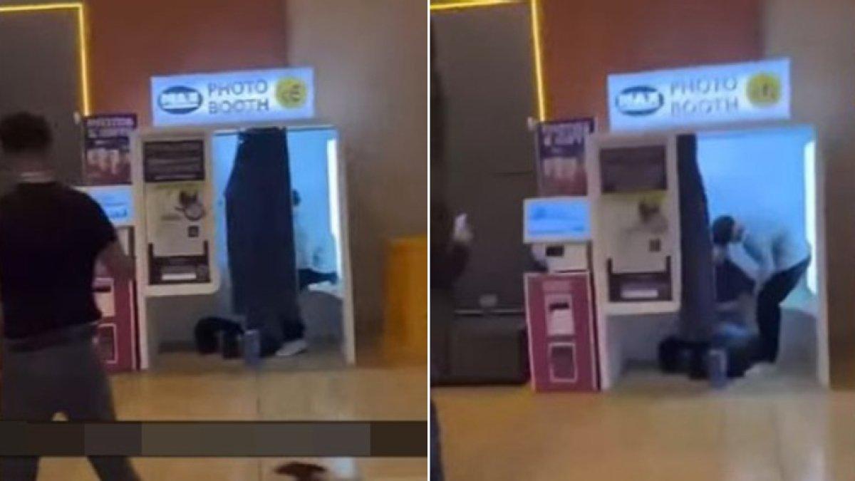 Pasangan kepergok berhubungan badan di photo booth di mal.