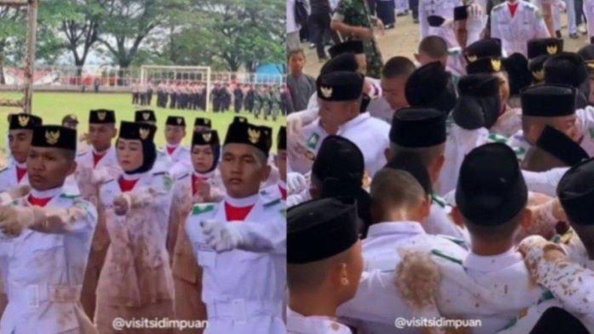 Momen haru dialami oleh petugas Paskibraka yang berhasil kibarkan bendera Merah Putih saat upacara HUT Ke-78 RI di tengah kondisi jalanan yang berlumpur