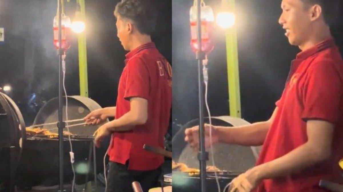 Pedagang makanan di Manokwari tetap jualan meski tangan diinfus.