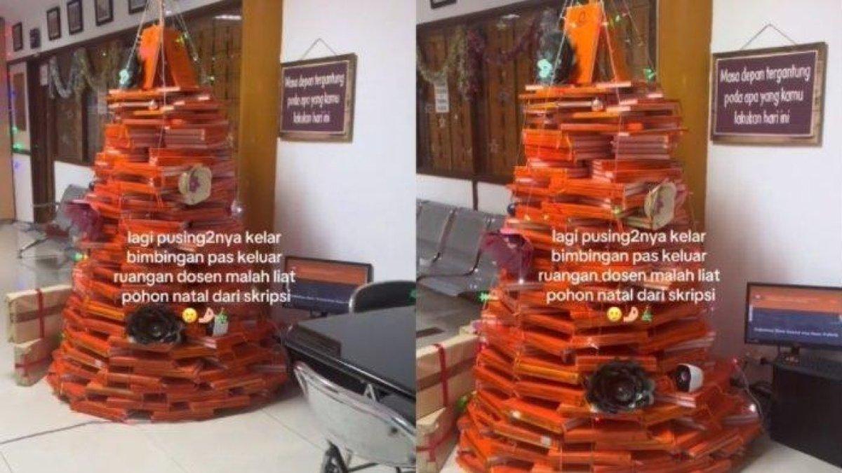 Penampakan pohon Natal yang terbuat dari tumpukan skripsi