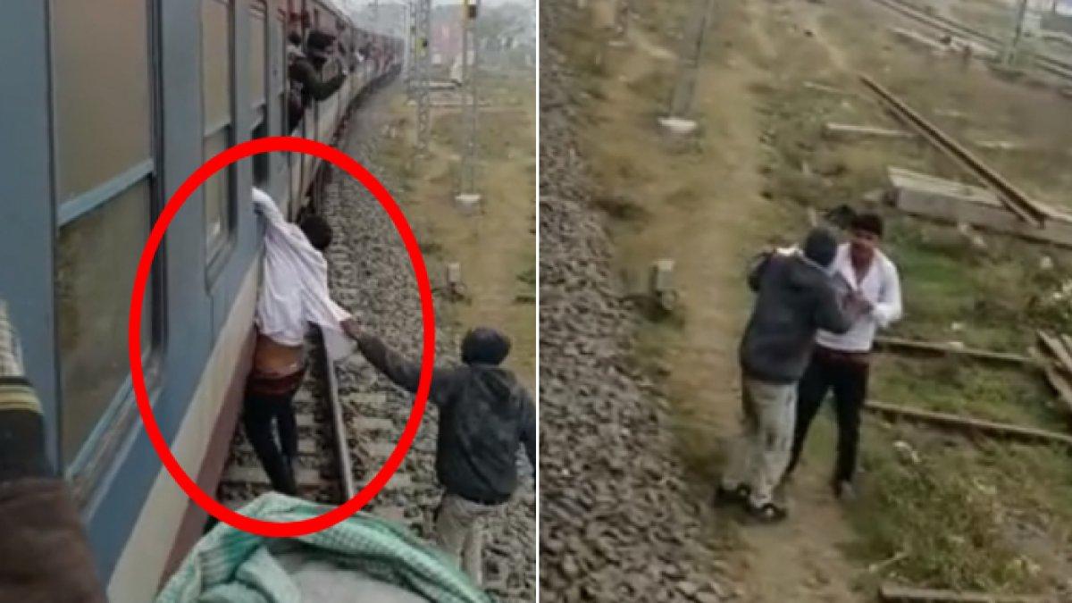 Pencopet bergelantungan di kereta yang berjalan, tak bisa melarikan diri karena dicengkeram penumpang.