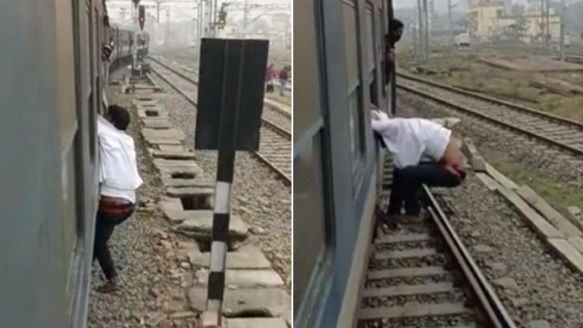 Pencopet bergelantungan di kereta yang berjalan, tak bisa melarikan diri karena dicengkeram penumpang.