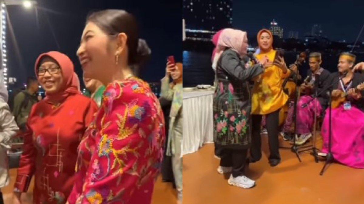 GAYA SELVI ANANDA - Potret Selvi Ananda saat berkunjung ke Kota Makassar. Asyik nyanyi dan berjoget bareng ibu-ibu.