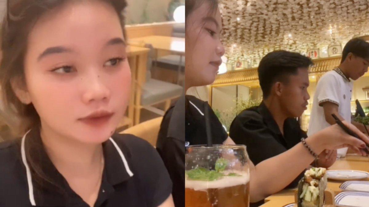 Pria kencan dengan wanita di restoran Jepang