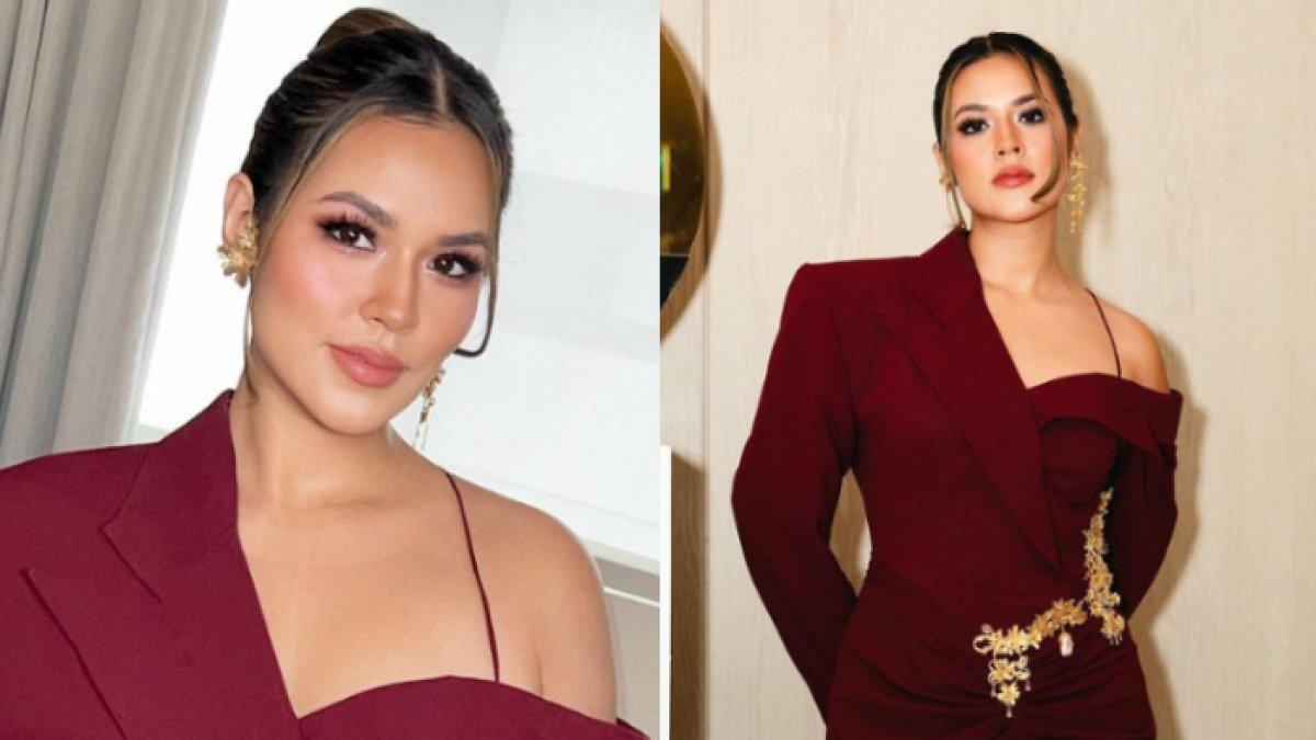 Rambut Raisa dicepol dengan menyisakan sedikit poni di bagian depan.