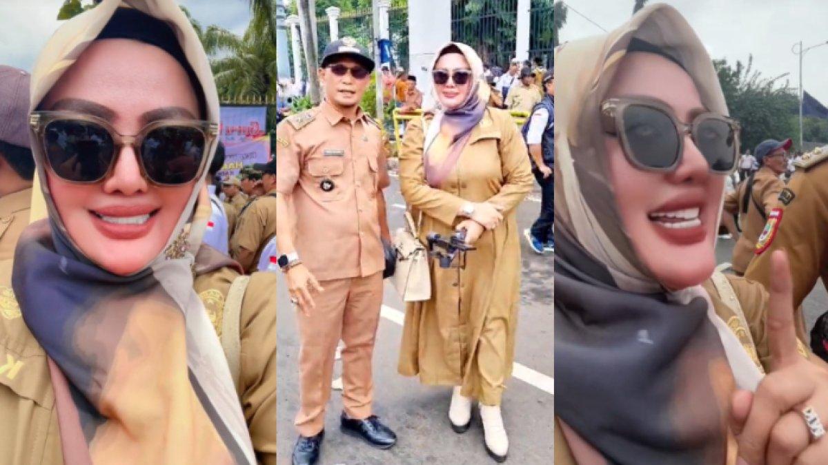 Saat berdemo, Wiwin Komalasari tampil modis