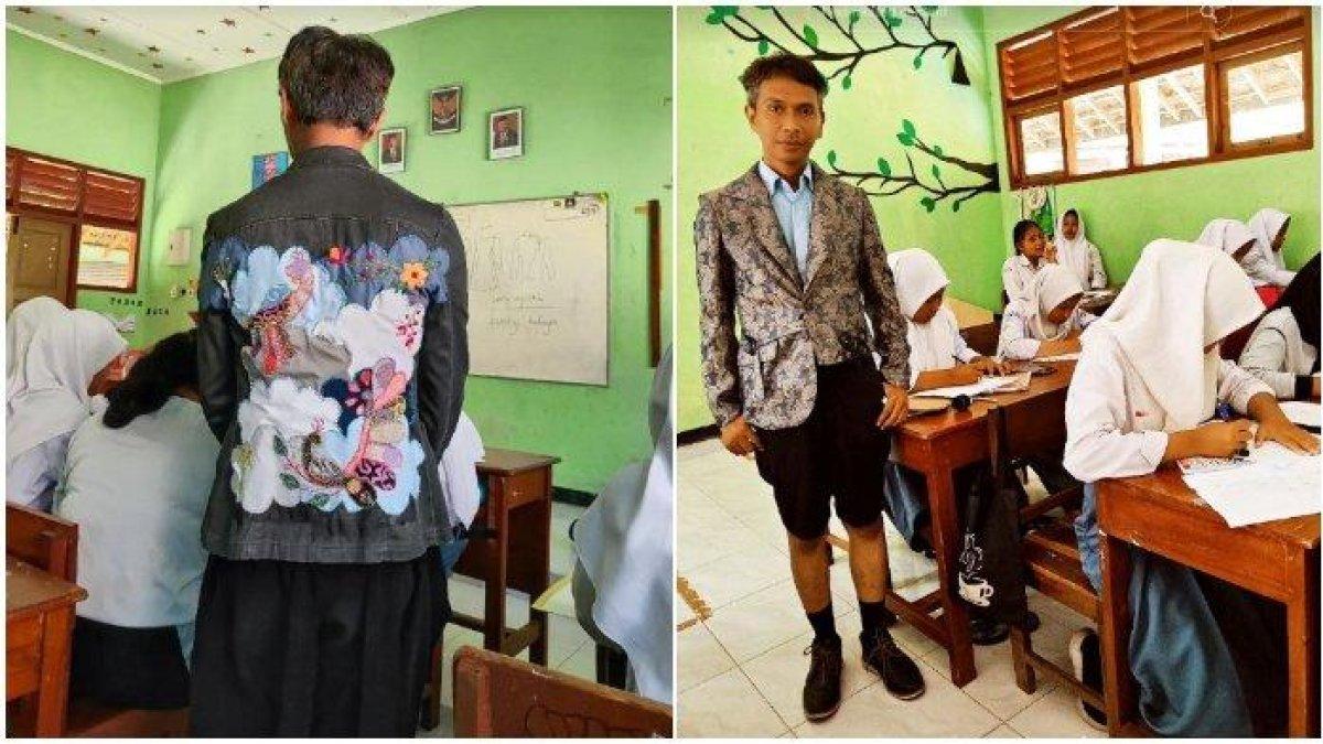Seorang guru di Yogyakarta mengenakan sejumlah kostum hasil harya anak didiknya