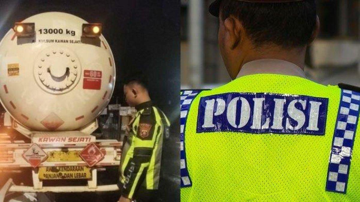 Seorang polisi syok ketika mengevakuasi korban kecelakaan