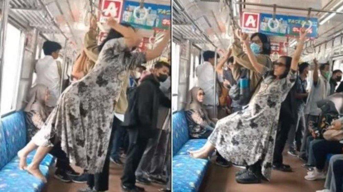 Seorang wanita bergelantungan di KRL dan usir penumpang lain