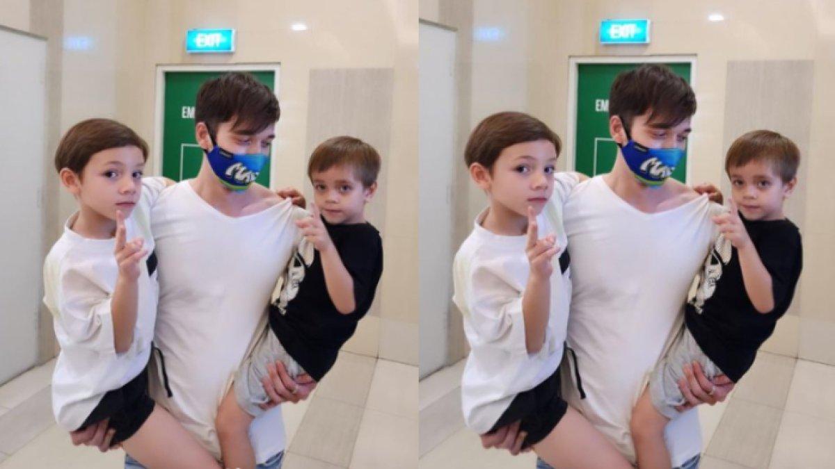 Stefan William gendong Cio dan Koa