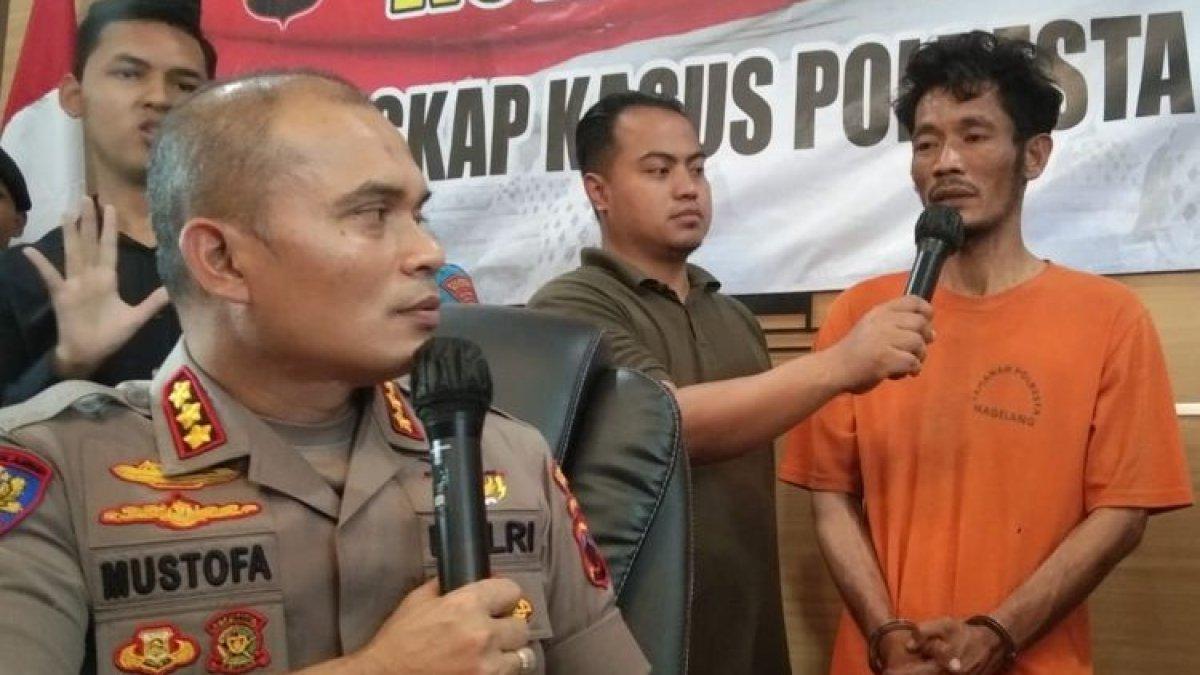 Sujarwin yang berbaju oranye