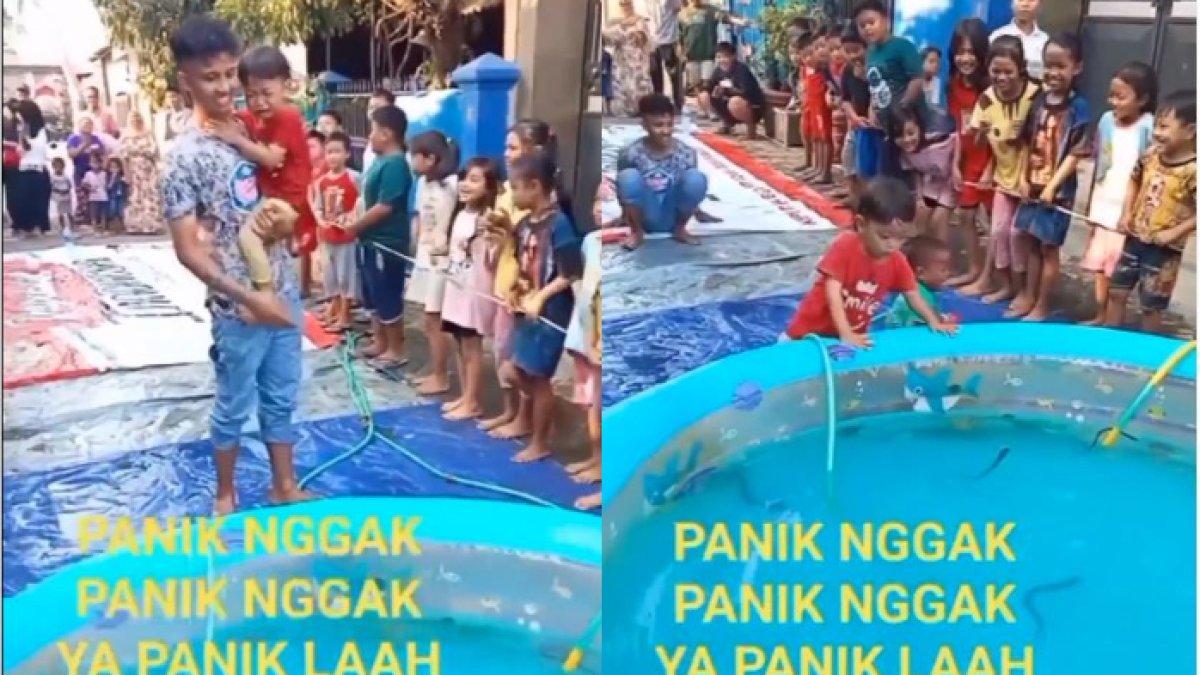 Tampak bocah berbaju hijau