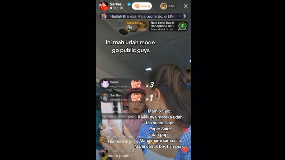 REAKSI ANAK RUBEN ONSU - Thania pun menyapa Gio sembari melambaikan tangan di kursi belakang.