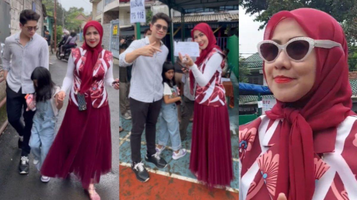 Venna Melinda datang ke TPS memakai busana bernuansa merah