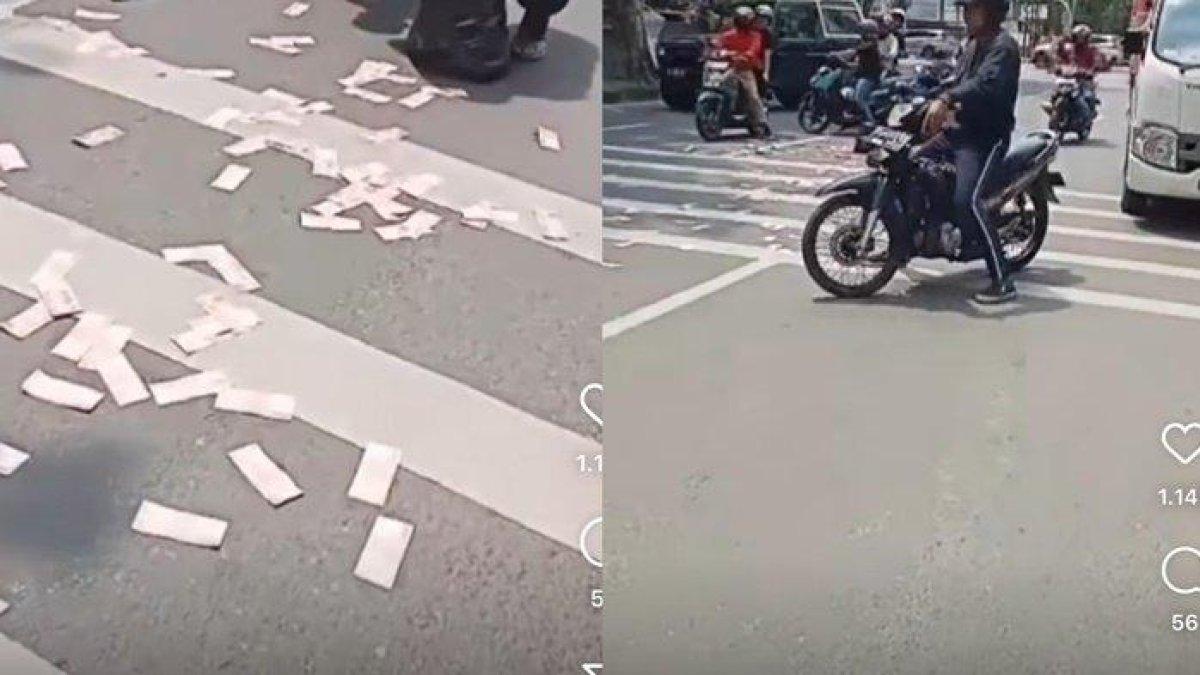 Viral uang pecahan Rp 100 ribu berserakan di jalanan Kota Medan
