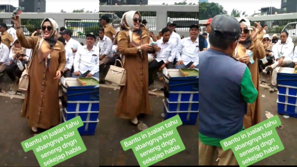 Wiwin membantu penjual tahu