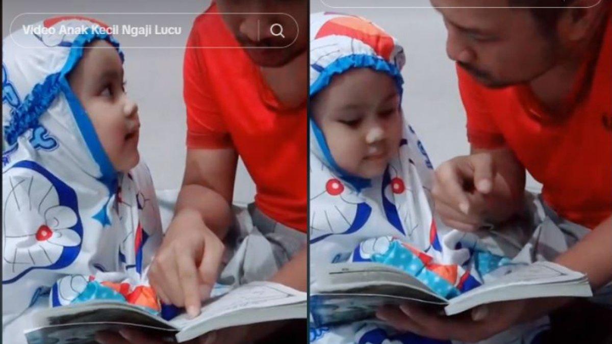 Bocah perempuan ini menangis sesenggukan saat belajar mengaji dengan ayahnya
