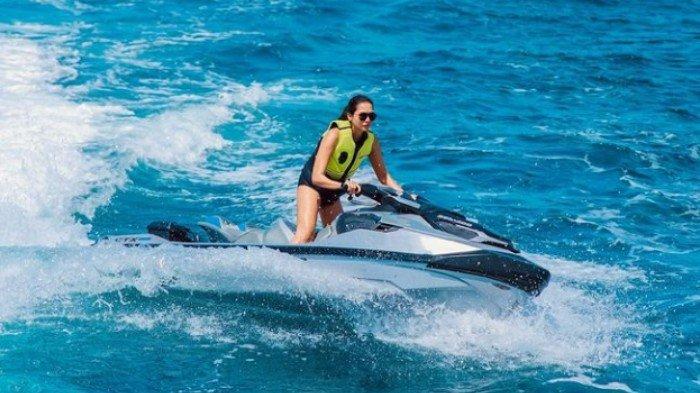 Mengatasi bosan dengan pergi traveling