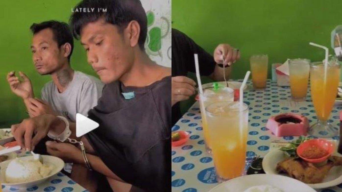 dua orang tahanan diajak makan enak oleh polisi di sebuah warung lesehan.