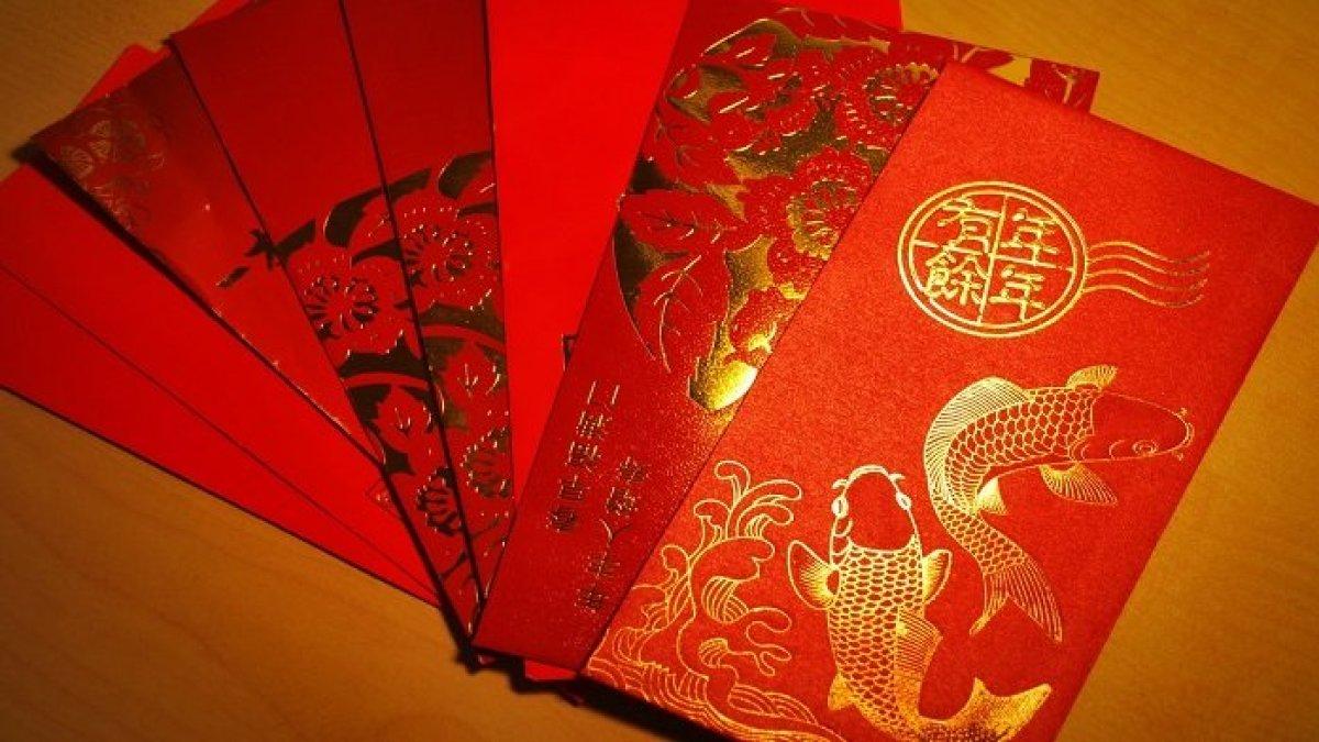 Ilustrasi angpau di perayaan Tahun Baru Imlek