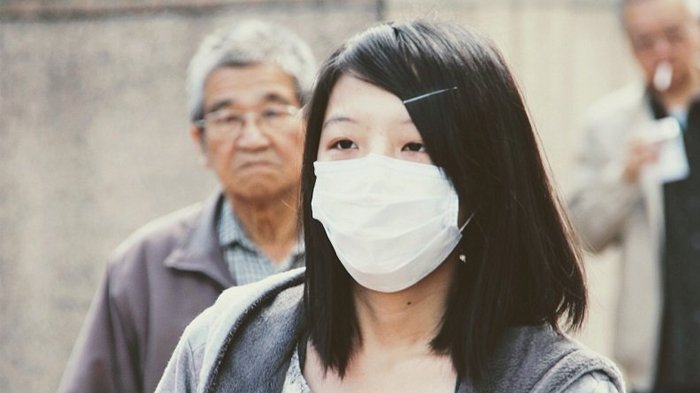 hindari polutan udara dengan menggunakan masker
