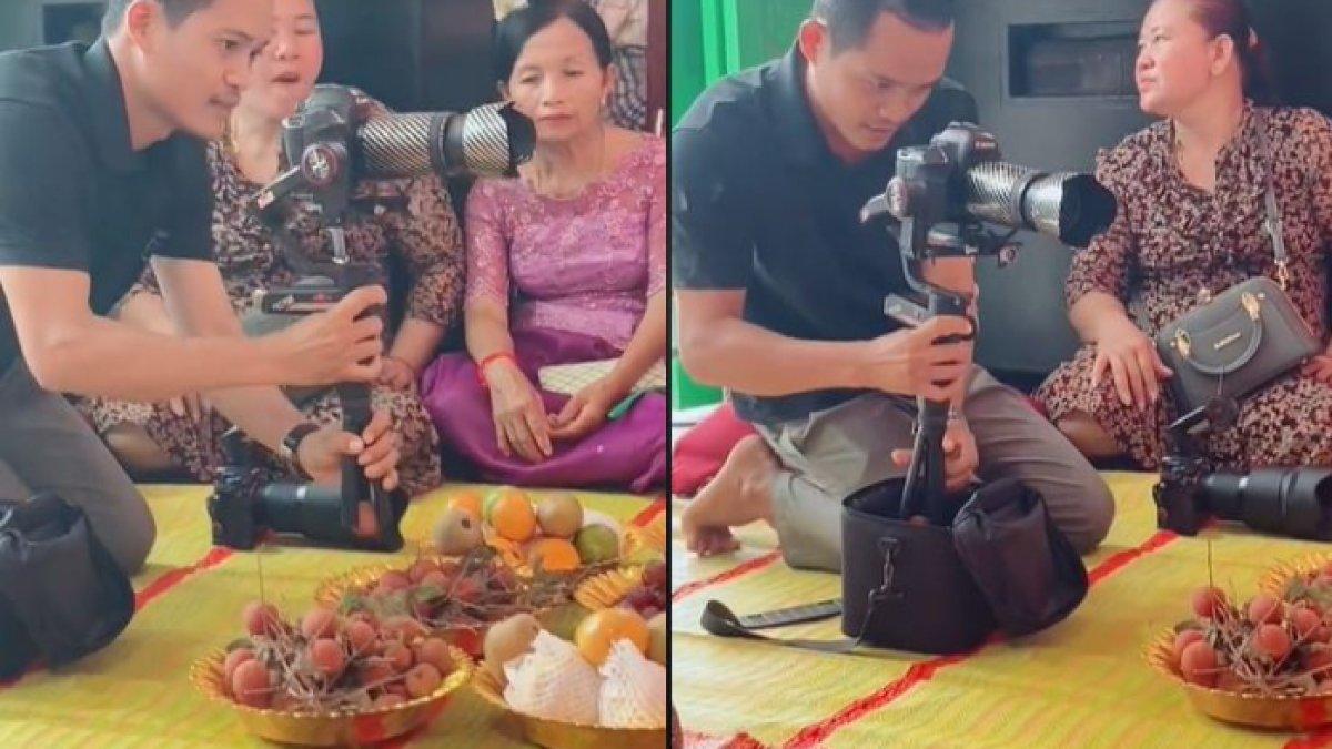 Pria tersebut menggunakan tripot