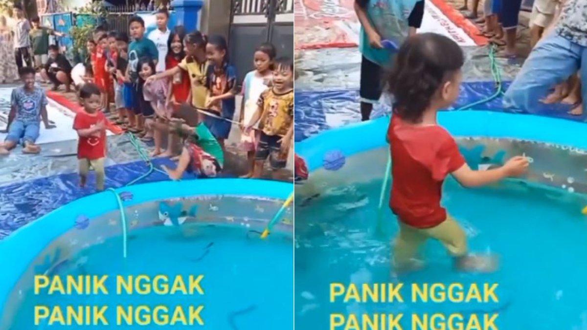 terdapat video kocak lomba menangkap belut yang dilakukan anak-anak