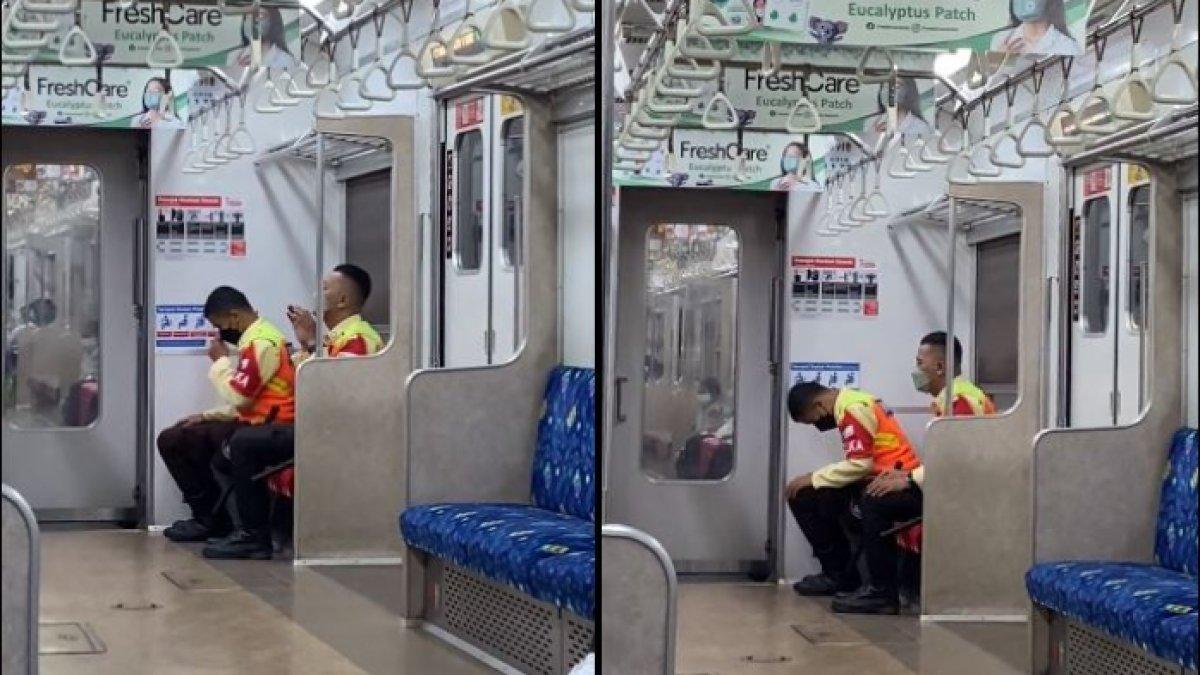 terlihat dua petugas KRL tengah khusyuk melaksanakan sholat