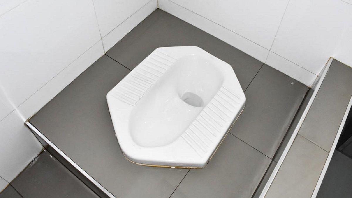 Ilsutrasi - WC jongkok 